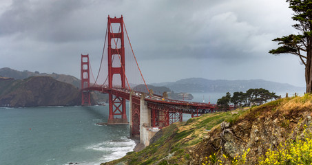 Golden gate bridge in San Francisco in storming clouds, California, USA 
