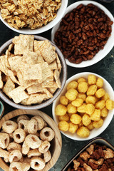 Cereal. Bowls of various cereals for breakfast. Muesli with kids cereals.