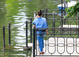 girl in jeans at the marina