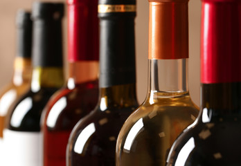 Bottles of different wines, closeup. Expensive collection