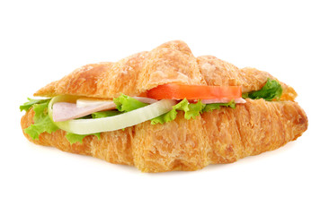 Fresh croissant sandwich isolated on white background.