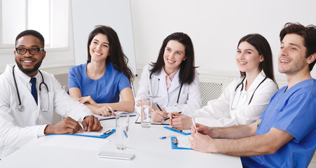 Fototapeta premium Successful Interns And Doctors Listening Lecture At Conference