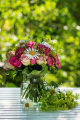 Summer flower arrangement with pink roses