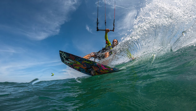 Kite surfer on the waves