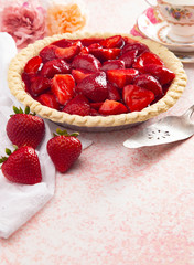 A Fresh Strawberry Pie on a Pink Table