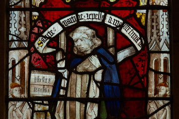 Character represented in the stained glass window of the St Martin le Grand church in York....