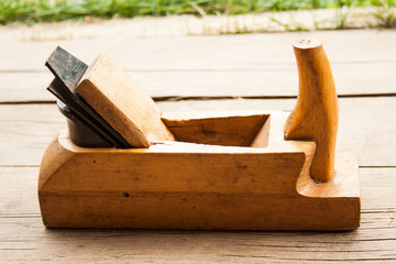 old wooden plane on wood