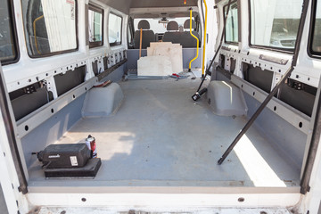 Repair and additional equipment of the truck car in the back of a van with a large luggage...