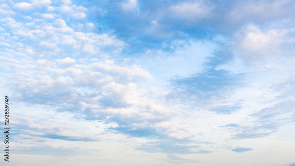 Wall mural sky with white and gray clouds in summer evening