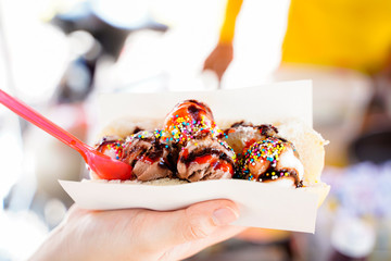 Coconut cream, street food, bright colors, morning light, Phuket, Thailand