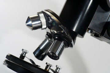 This is an old microscope in good condition and working