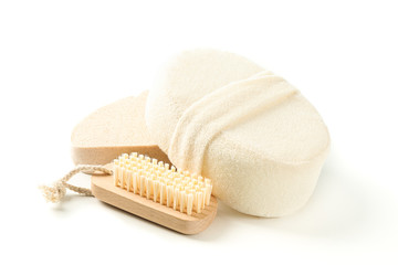Wooden bath brush and sponges isolated on white background