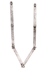 Old iron meter ruler letter V