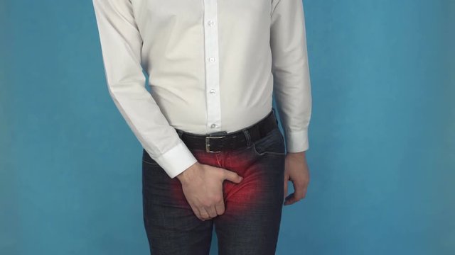 Urinary system disease. Man has pain due to prostatic hyperplasia. Concept of adenoma prostate or enuresis. Person with AIDS or HIV. Manager in white shirt suffers from diarrhea or gonorrhea. Office