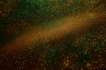 Fototapeta na wymiar Glitter vintage lights background.Abstract Gold. Glitter wonderful lights background.