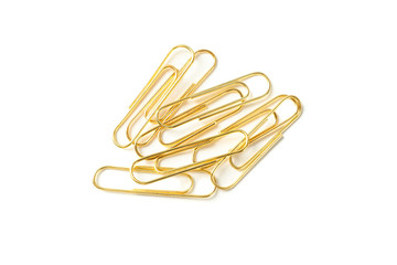 Gold paper clips isolated on white background, closeup