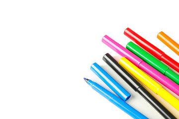 Color markers isolated on white background, closeup