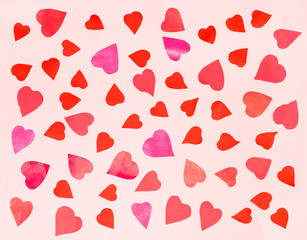 hearts cut from color papers on pink pastel paper