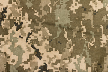 Closeup of military uniform surface.