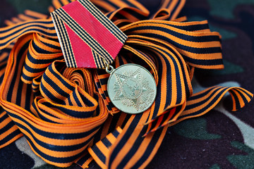 Military uniform, St. George ribbon closeup. Victory symbol