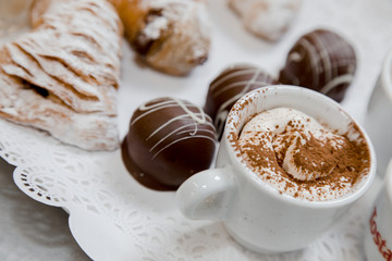 coffee, chocolate and croissant