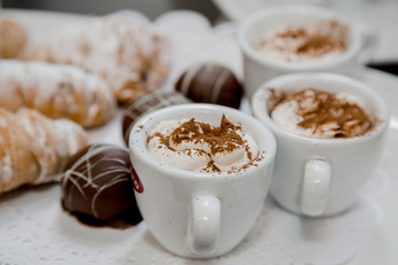 coffee, chocolate and croissant
