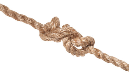 stevedore knot tied on thick jute rope isolated
