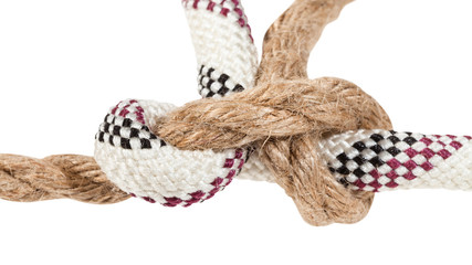 grass knot joining two ropes close up isolated