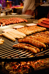 Large round barbecue of sausages and grilled meat