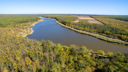 Fototapeta premium Aerial view on the lake in the middle of the forest. Alexandrovsky forest. Rostov region. Russia