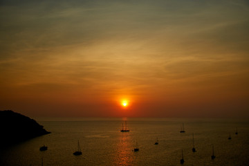 Sunset about sea with boat Thailand Phuket