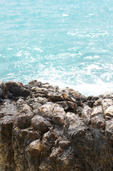 Cliffs at  bright blue sea coast