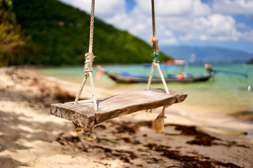 Swing at a tropical beach in Thailand