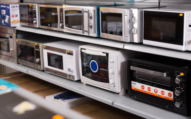 Assortment of a kitchen microwave at household  appliances shop