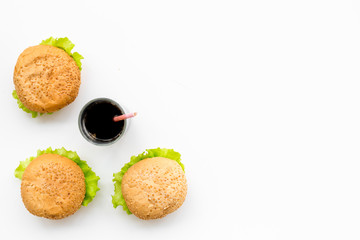 USA burgers and coke on white background top view copy space