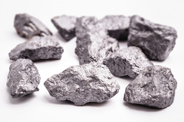 Concept of luxury, rarity. Silver nugget isolated on white background, raw gemstone.