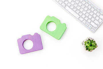 photo camera for blogger with keyboard on white background top view