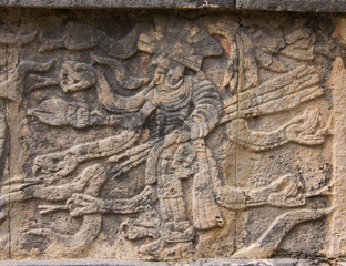 Fototapeta na wymiar Engravings on the Temple Walls at Chichen Itza