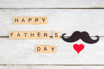 Happy Father's day on wooden background. symbols of love, father, man. happy Valentine's day background. copy space for inscription.