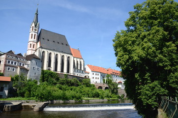 Fototapeta na wymiar Church and River Vltava in Cesky Krumlov in the Czech Republic