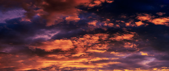 Panoramic view of a stormy sky during sunset.
