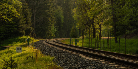 Fototapeta na wymiar Railway track with sunset in spring color evening