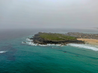 St Michael's Mount bay, Cornwall, England, United Kingdom. Bay with beach and sea during cold foggy morning.