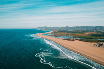 view of beach with sea and blue sky