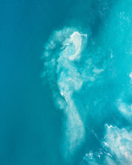 aerial view of waves in ocean