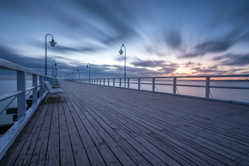 Wooden pier in Gdynia Orlowo. Early morning on the Baltic Sea. Poland, Europe.