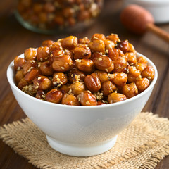 Chickpeas roasted with sesame and honey, photographed with natural light (Selective Focus, Focus one third into the chickpeas)