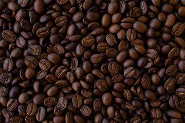 Background made of coffee beans, top view for copy space