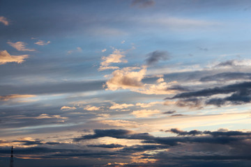 Naklejka na ściany i meble beautiful sunset on evening sky with colorful clouds