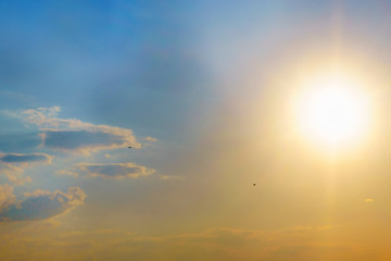 bright sun against blue sky